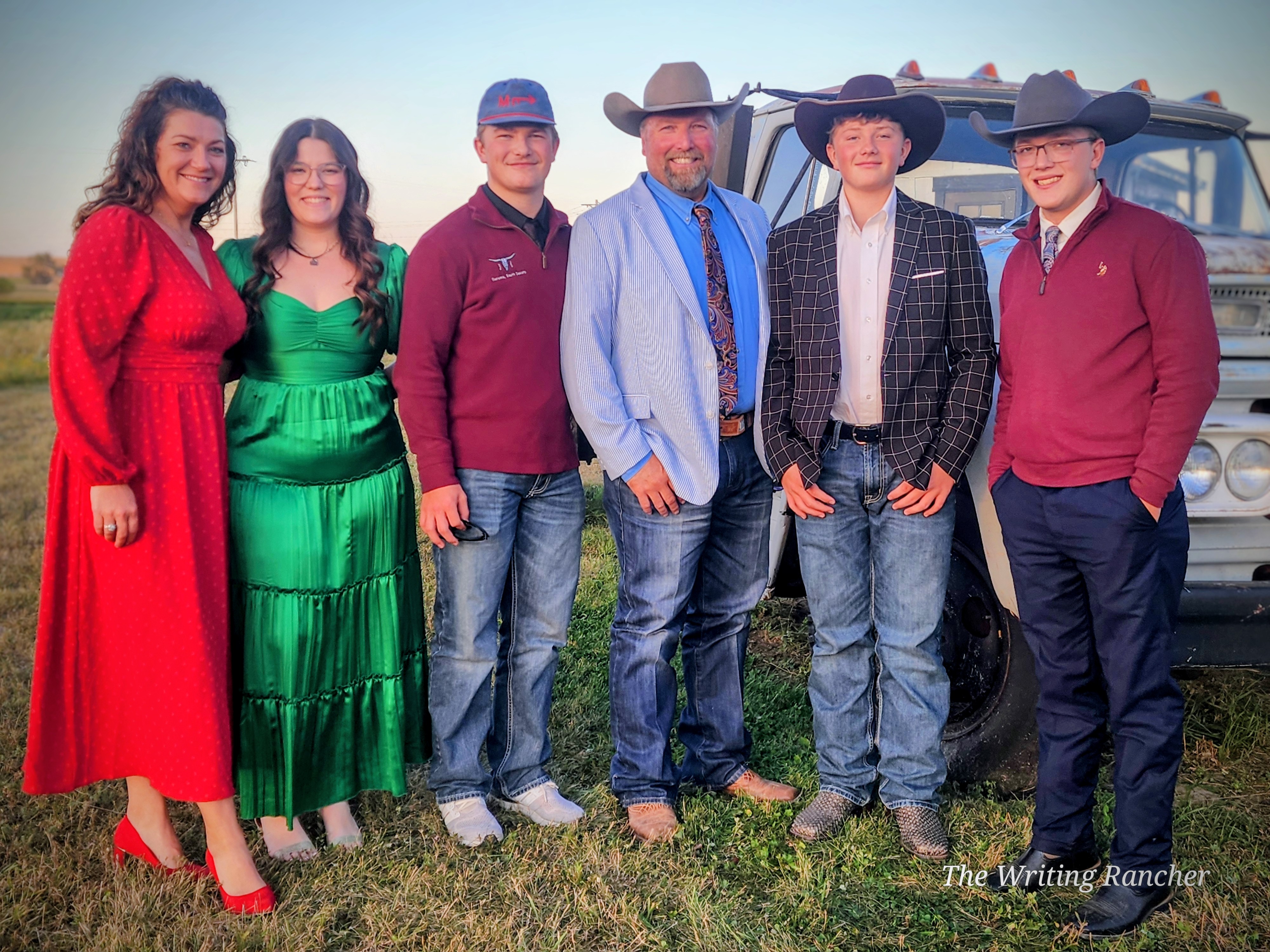 The Blum family poses for a picture as wedding guests in September 2025.